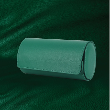 The Green Lion Duo Watch Roll Case in Rolex Green is a stylish and protective case made to store treasured timepieces. It is crafted with real leather