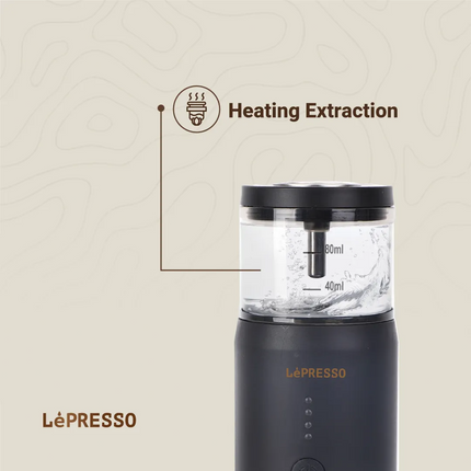 LePresso coffee maker with heating extraction feature on a beige background