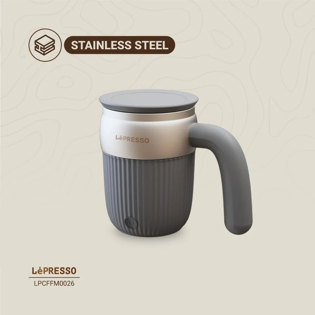 Stainless steel mug with handle on a beige background, featuring the Le'Presso brand.