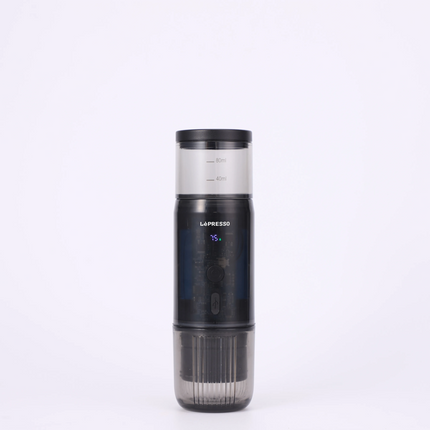 Black and clear portable espresso machine with digital display on a white background