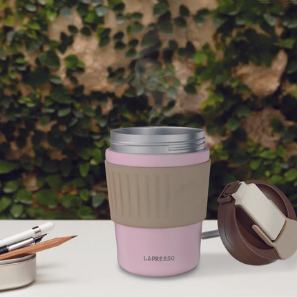The Lepresso Morningscape Tumbler Mug Dual Sip finds the perfect synergy between the aspects of style, utility, and environmental affairs. The tall an
