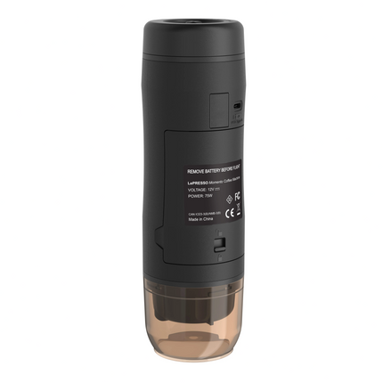 Black and clear portable coffee maker on a white background