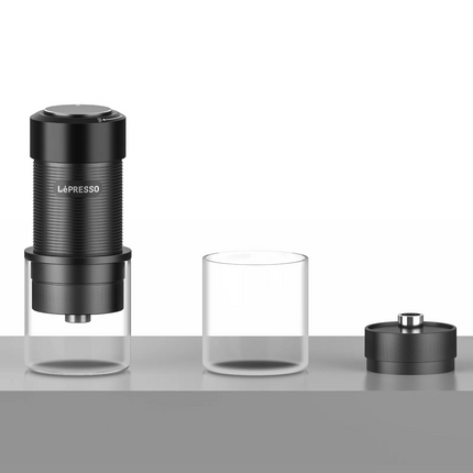 La'Presso coffee maker with two clear glasses on a gray surface