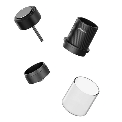 Black coffee brewing components with a glass carafe on a white background