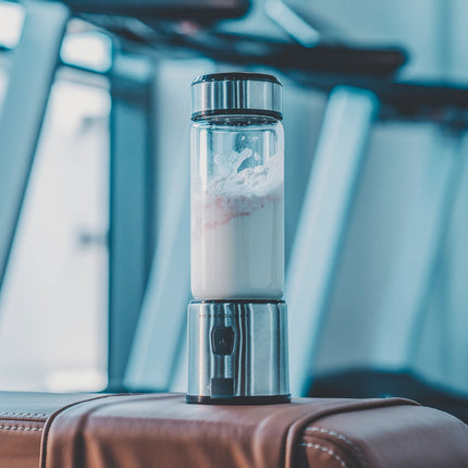 Beverage maker on a suitcase with blurred background