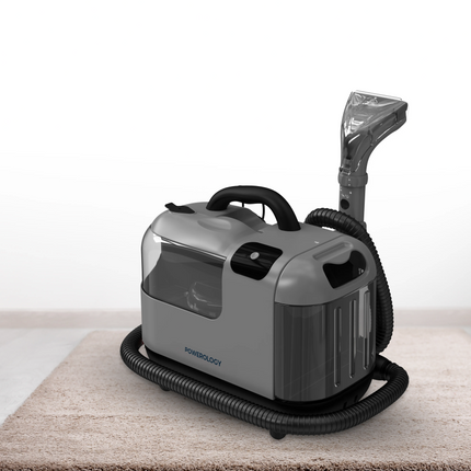 Gray steam cleaner with a hose on a white background