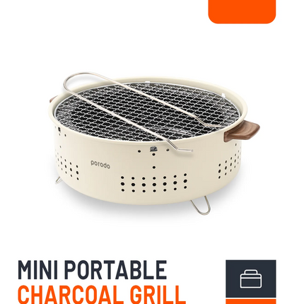 With its compact and portable form, the Porodo Lifestyle Mini Portable Charcoal Grill captures the spirit of outdoor cooking. Its lightweight design m
