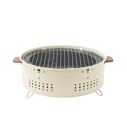 With its compact and portable form, the Porodo Lifestyle Mini Portable Charcoal Grill captures the spirit of outdoor cooking. Its lightweight design m
