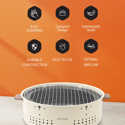 With its compact and portable form, the Porodo Lifestyle Mini Portable Charcoal Grill captures the spirit of outdoor cooking. Its lightweight design m