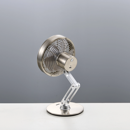 The Porodo Lifestyle Metal Desk Fan provides powerful, portable cooling with its sleek metal design, which is durable and fashionable. With its rechar