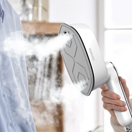 Make ironing easy with the Porodo Lifestyle Mini Steam Iron. With a powerful 1000W output and a ceramic soleplate, it ensures smooth and efficient iro