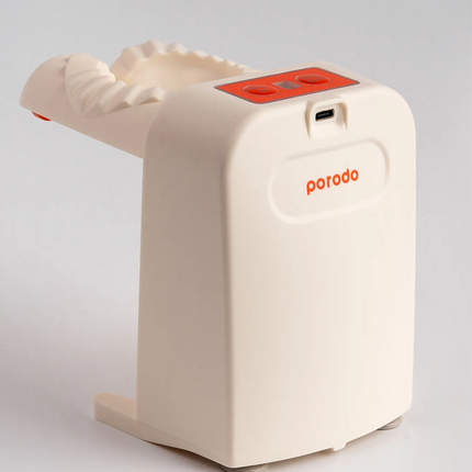 The Porodo LifeStyle Portable Dumpling Maker is an electronic and portable dumpling maker that makes it easy to create delicious dumplings at home. Wi