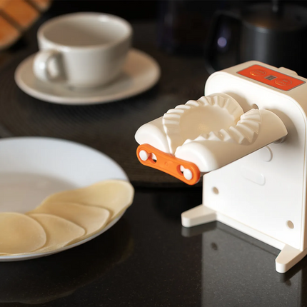 The Porodo LifeStyle Portable Dumpling Maker is an electronic and portable dumpling maker that makes it easy to create delicious dumplings at home. Wi
