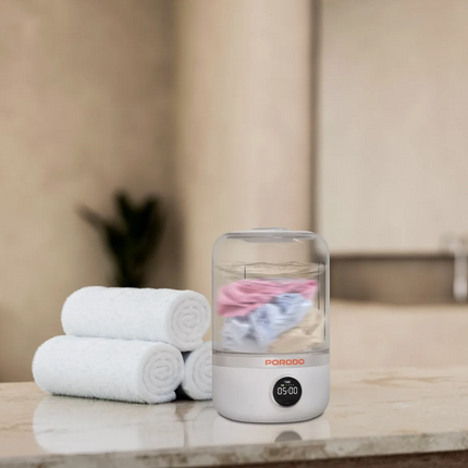 The Porodo Lifestyle Cordless Mini Washing Machine is incredibly small and efficient, designed for making quick laundry tasks very portable. With its 