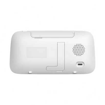 Back view of a white electronic device on a white background