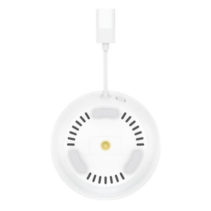 White smoke detector with a cable on a white background